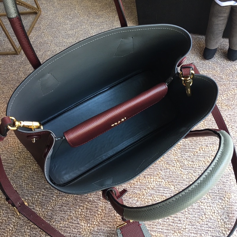 Pra*a top handle bags